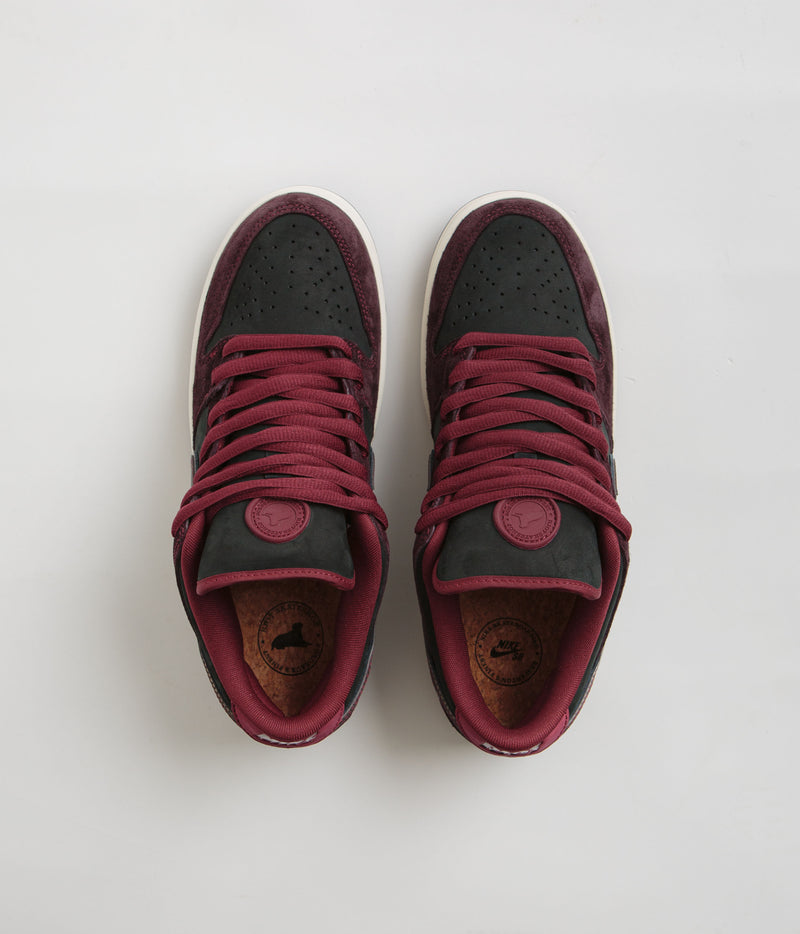 Nike SB x RIOT Skateshop Dunk Low Pro Shoes in Mahogany and Dark Beetroot and Team Red - Sail
