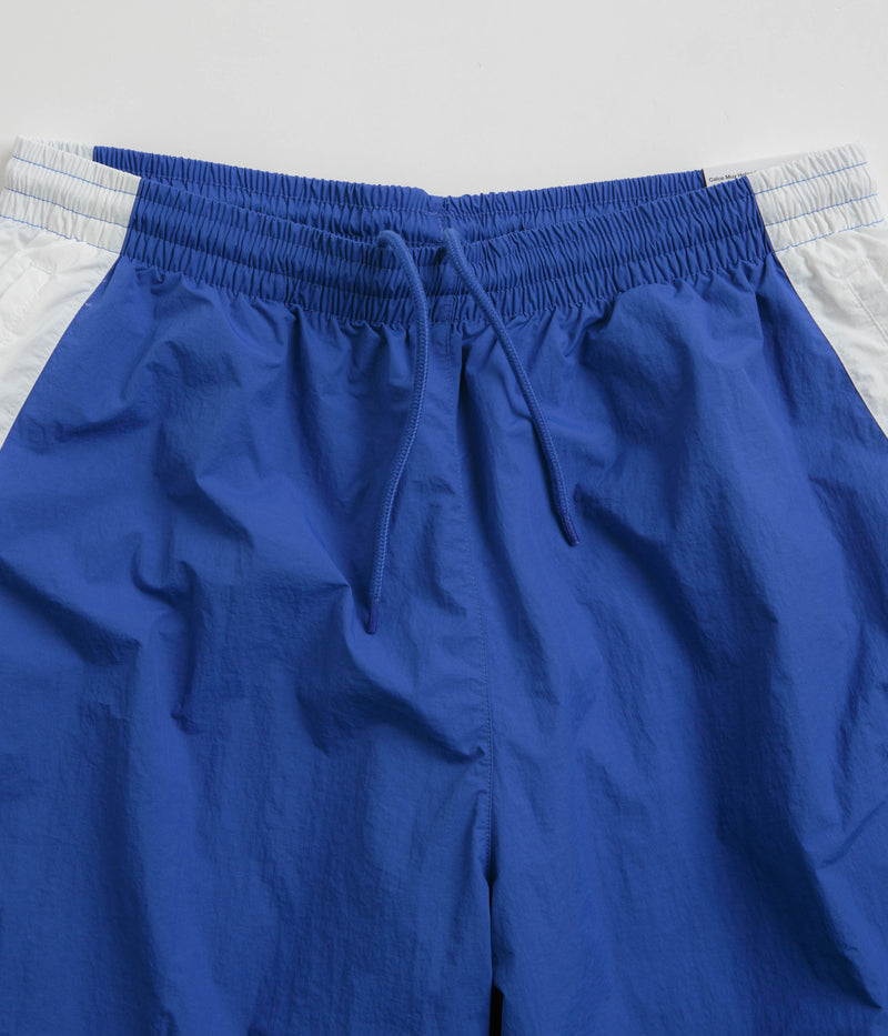 Nike Woven Track Pants in Game Royal and White / Obsidian / White
