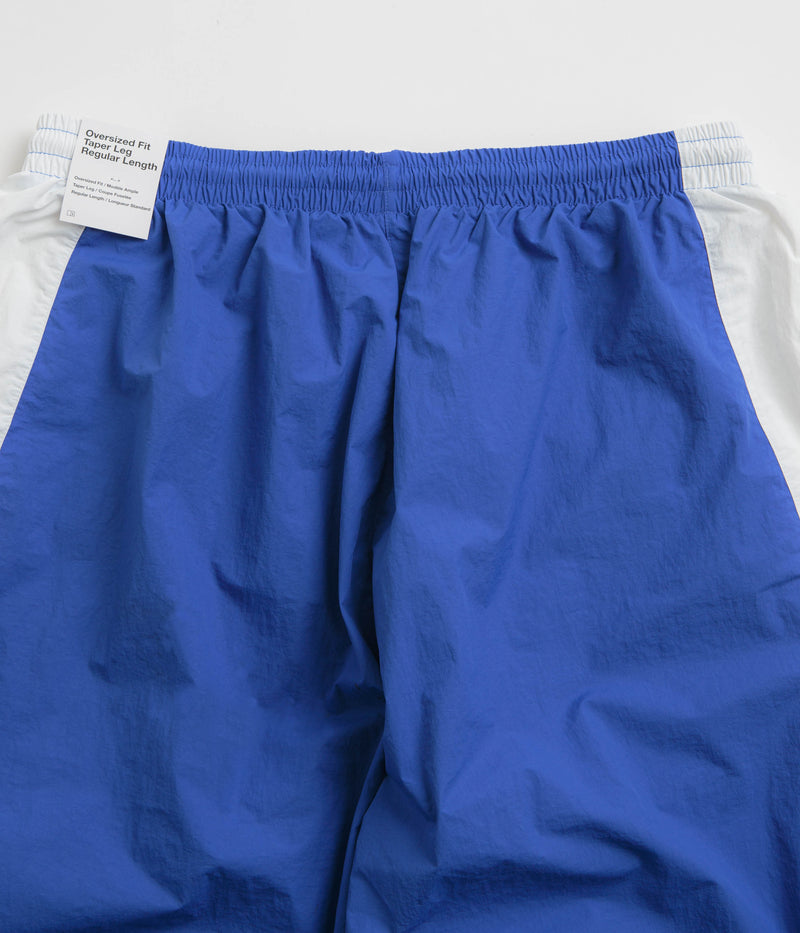 Nike Woven Track Pants in Game Royal and White / Obsidian / White