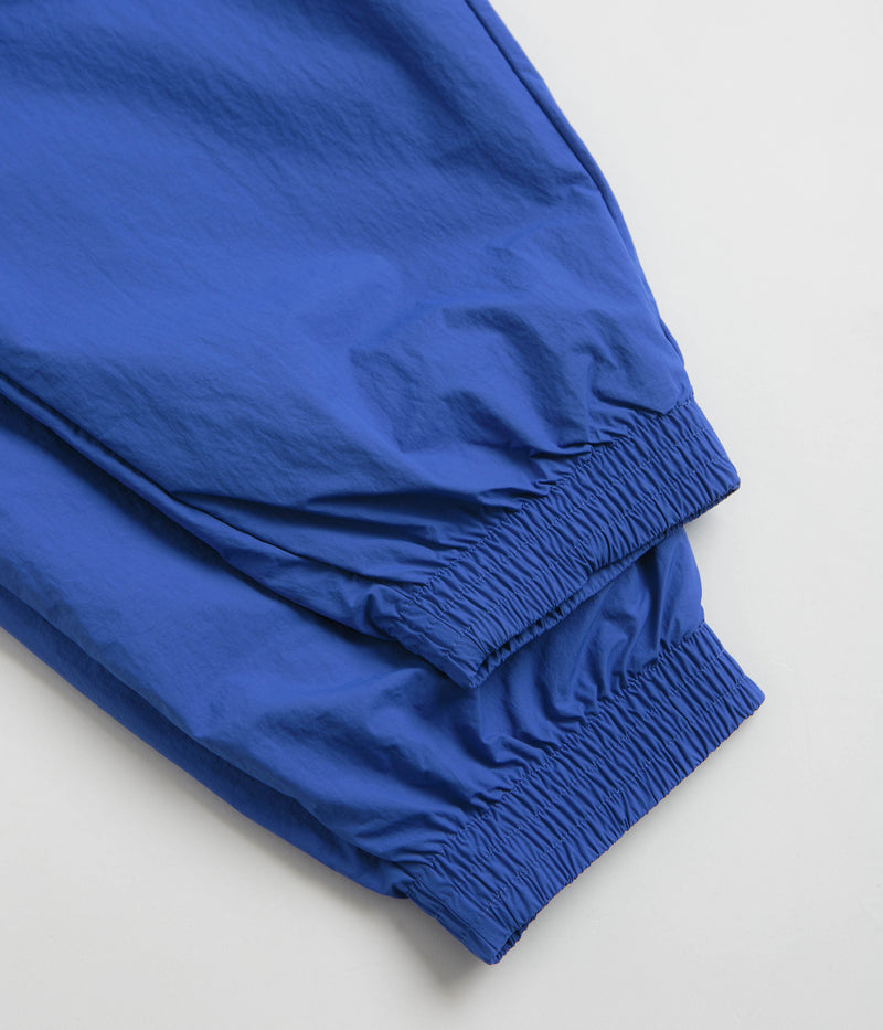 Nike Woven Track Pants in Game Royal and White / Obsidian / White
