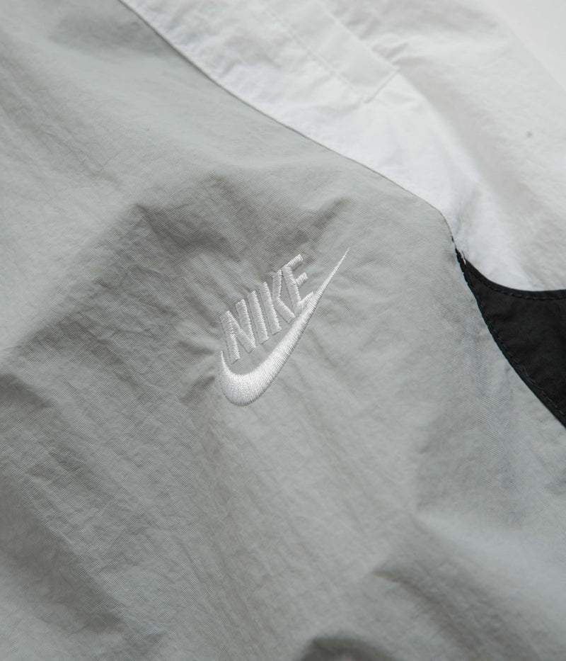 Nike Woven Track Pants in Light Smoke Grey and White / Black / White