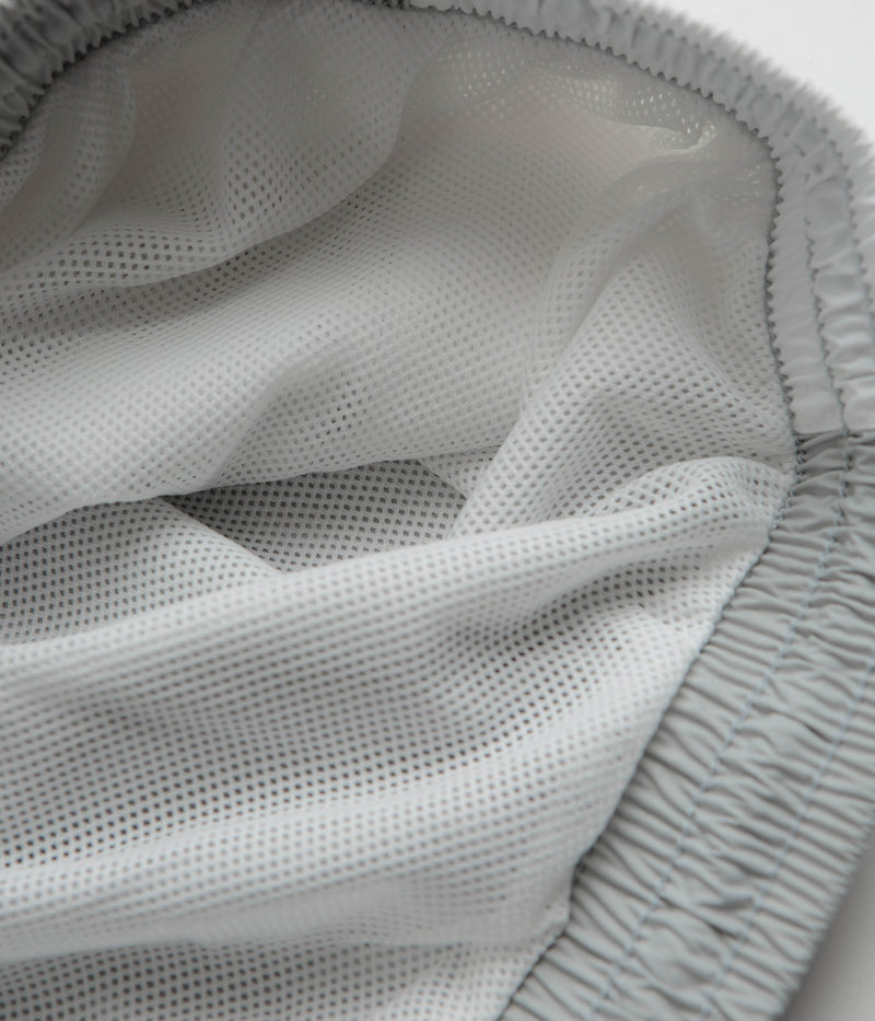 Nike Woven Track Pants in Light Smoke Grey and White / Black / White