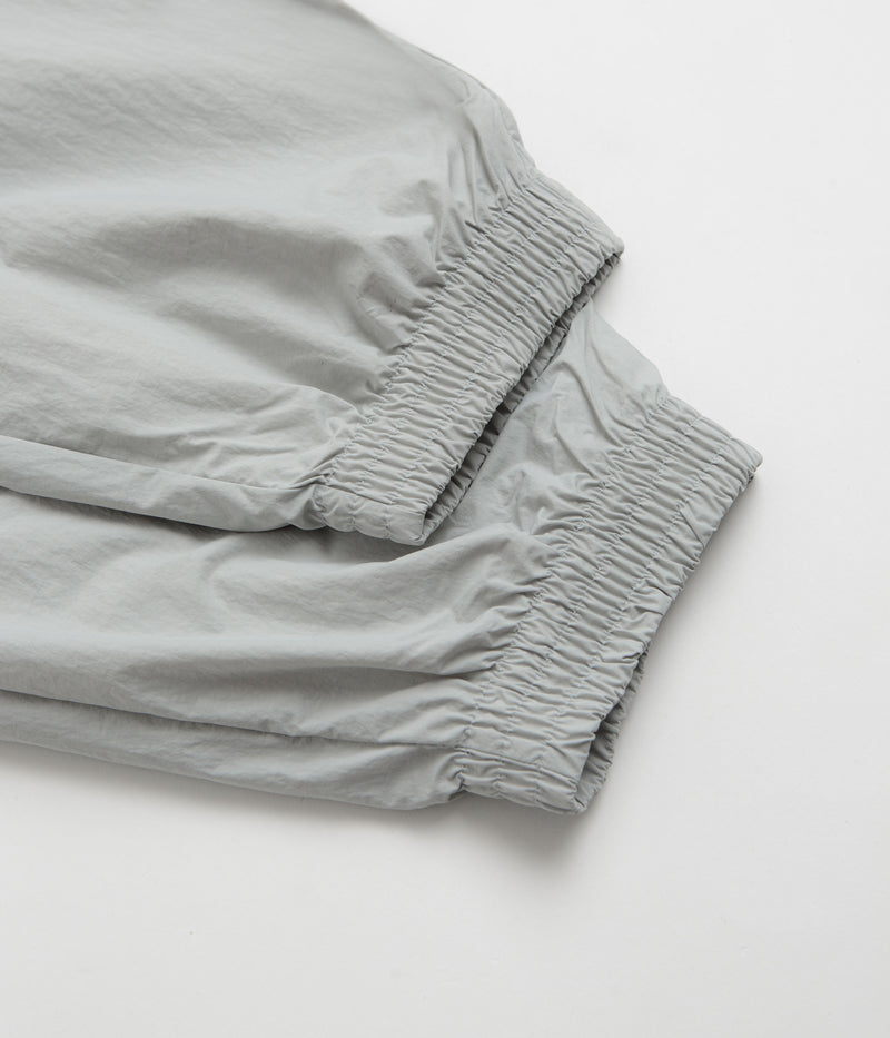 Nike Woven Track Pants in Light Smoke Grey and White / Black / White