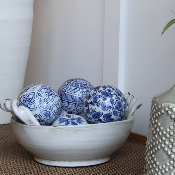 off white ceramic bowl with handles