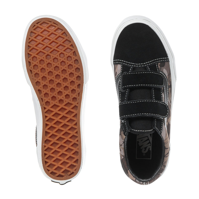 Kids sneaker outsole tread and black upper with camo lining, double hook-and-loop strap