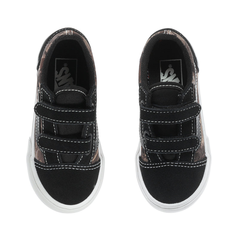 Toddler sneakers with black lining, camo side panels, hook-and-loop closure, white sole