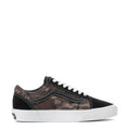 Youth low-top sneakers, black camo panels, white laces, white rubber sole