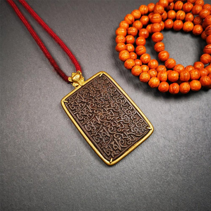 Om Melong Amulet 2.76" - Tibetan Buddhist amulet, front view