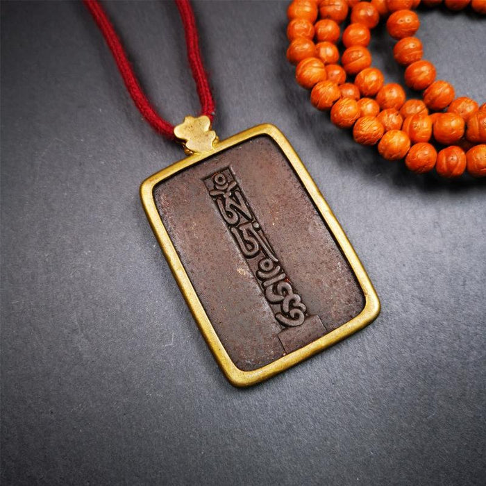 Om Melong Amulet 2.76" - Tibetan Buddhist amulet, close-up detail