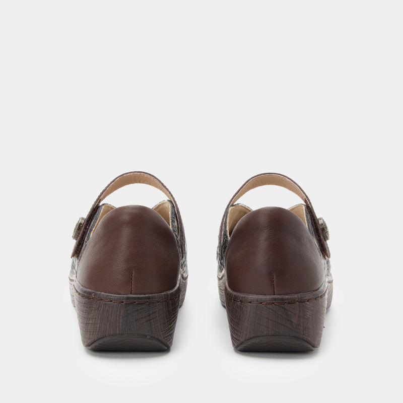 Opheliah Ivy Brush Bronze mary-jane style shoe on a Wood look rocker outsole.