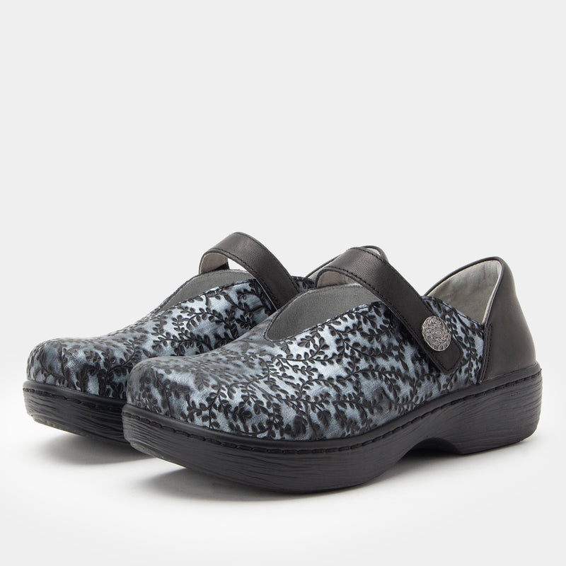 Opheliah Ivy Brush Silver mary-jane style shoe on a Wood look rocker outsole.