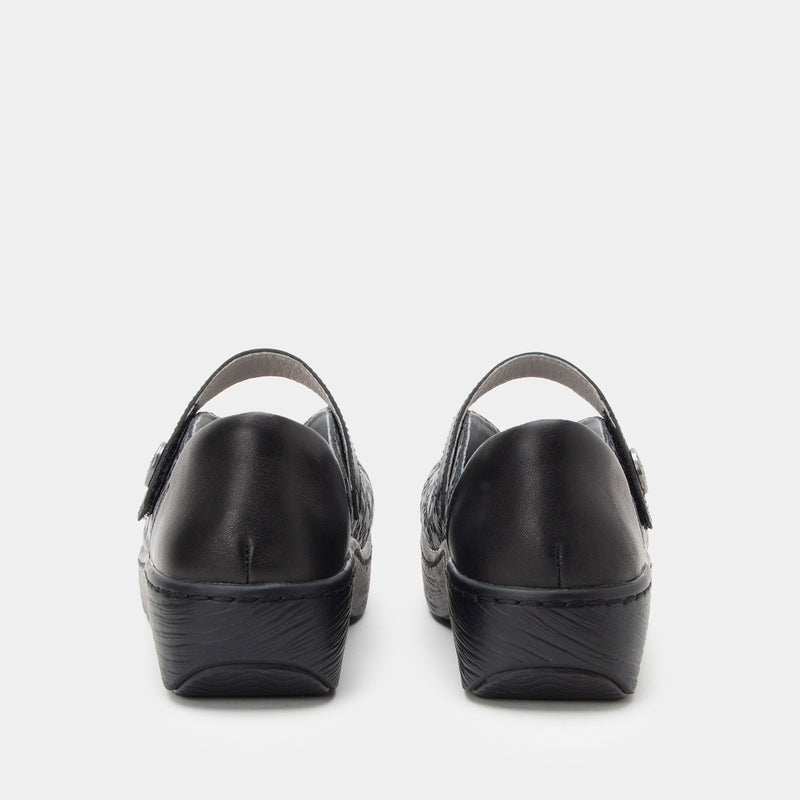 Opheliah Ivy Brush Silver mary-jane style shoe on a Wood look rocker outsole.