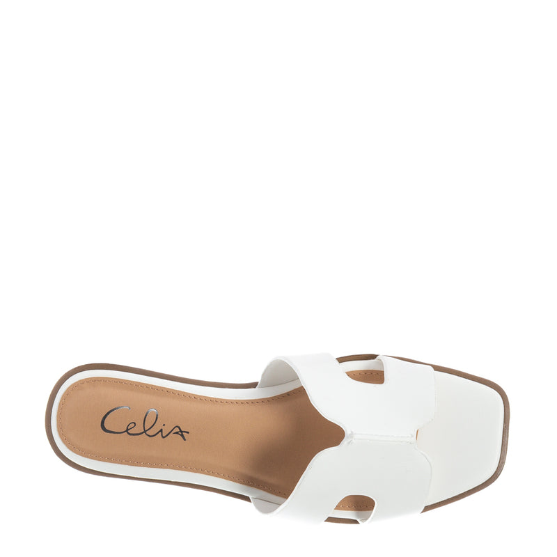 White slide sandal insole with 'Celix' branding and H-band strap