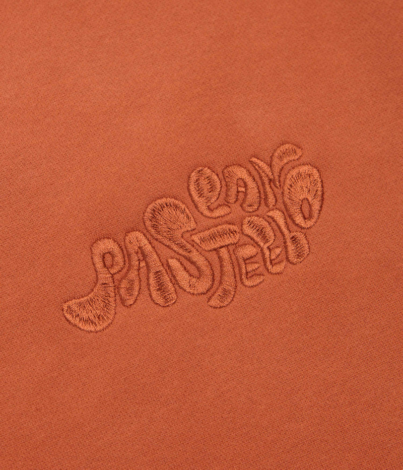 Pasteelo Can Embroidered Script Crewneck Sweatshirt in Rust