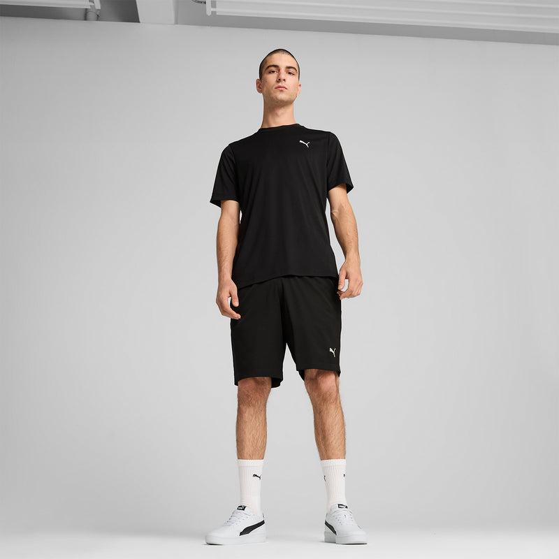 Black mens woven shorts with elastic waistband and PUMA logo on the leg