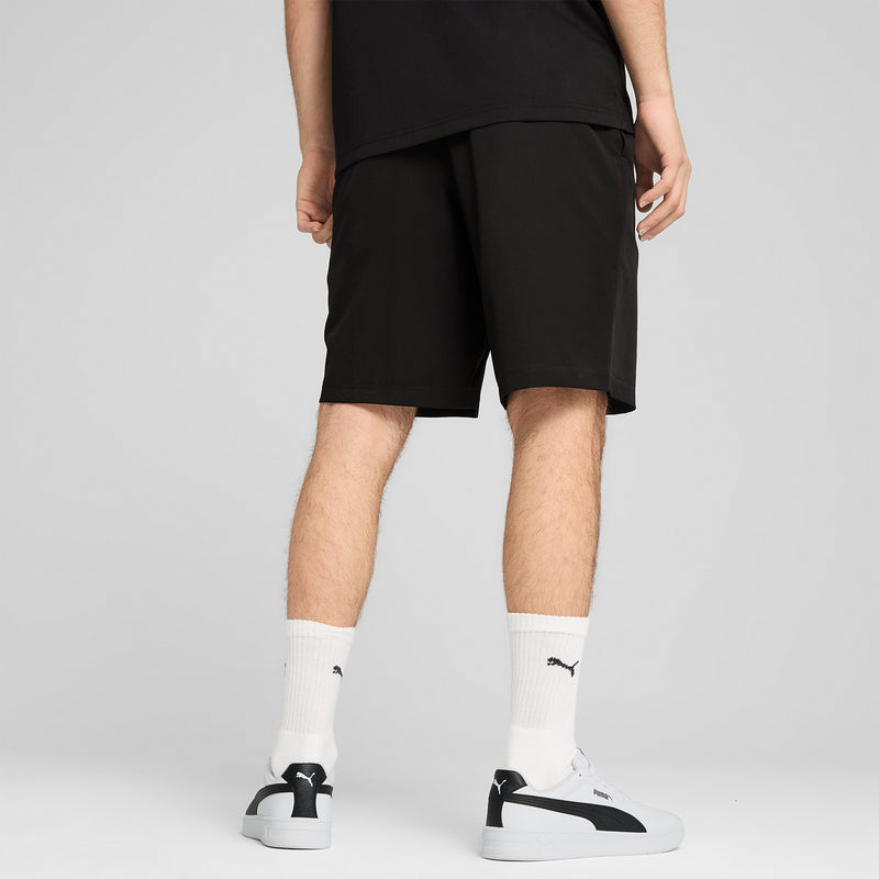 Black woven shorts with PUMA logo on the hem and straight relaxed legs