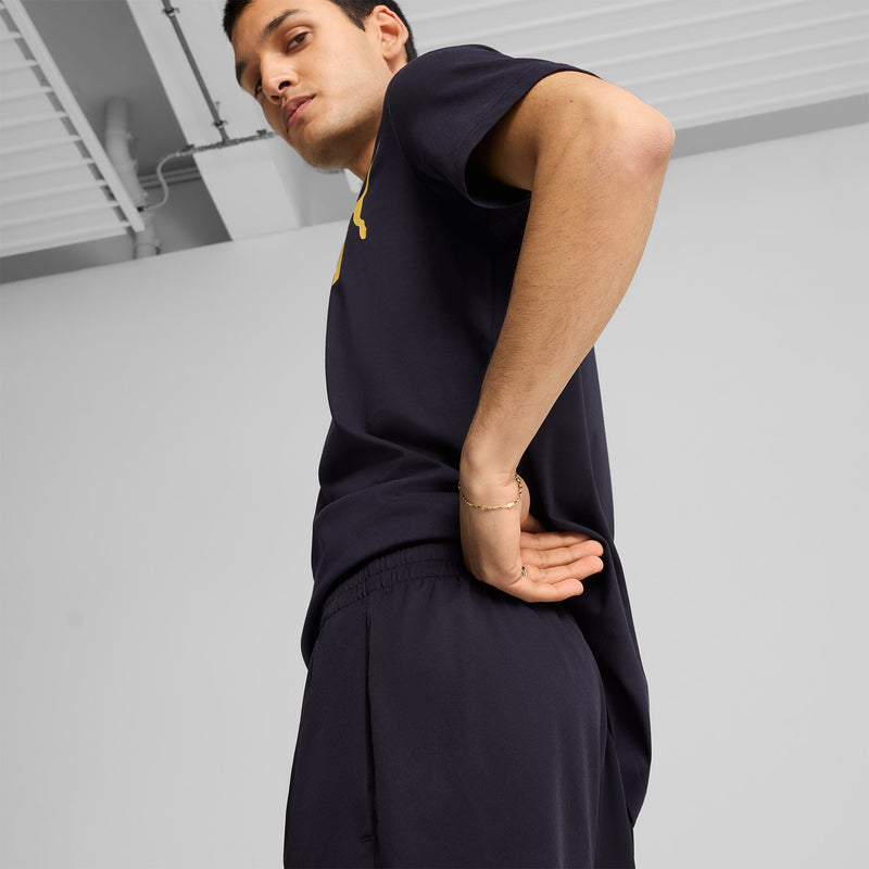 Navy woven mens shorts with elastic waistband and Puma logo on the leg.