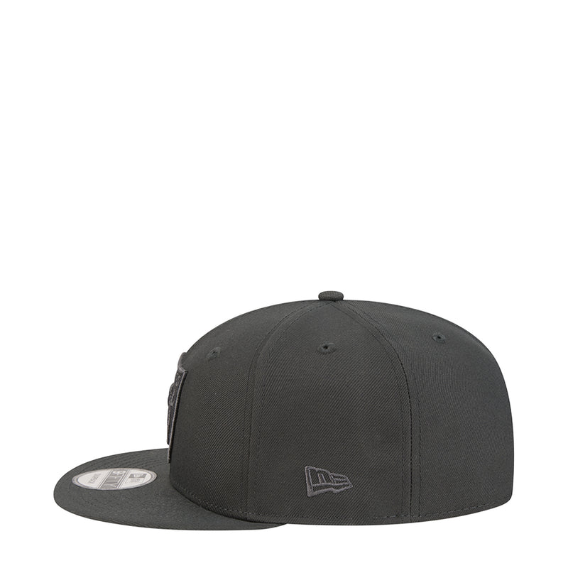 Dark gray Raiders baseball cap with tonal side flag logo