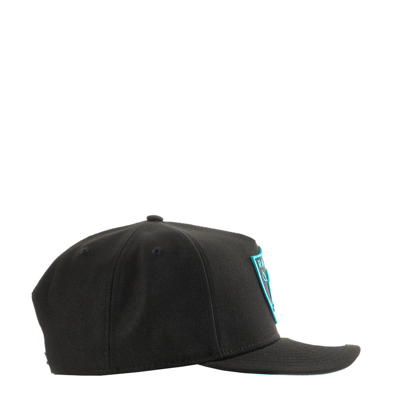 Black A-Frame baseball cap, side view with Vice Blue logo patch