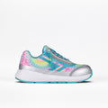 The Rainbow Tie Dye BILLY Goat by BILLY Footwear is a kids' adaptive athletic shoe featuring a vibrant tie-dye pattern in pink, yellow, blue, and green with silver metallic accents and a light blue sole, shown in side profile on white.