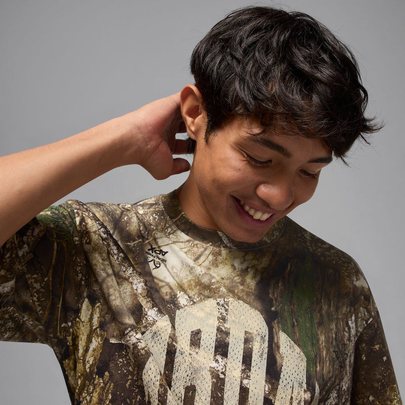 Men's crew-neck short-sleeve tee with Realtree camo and large white graphic
