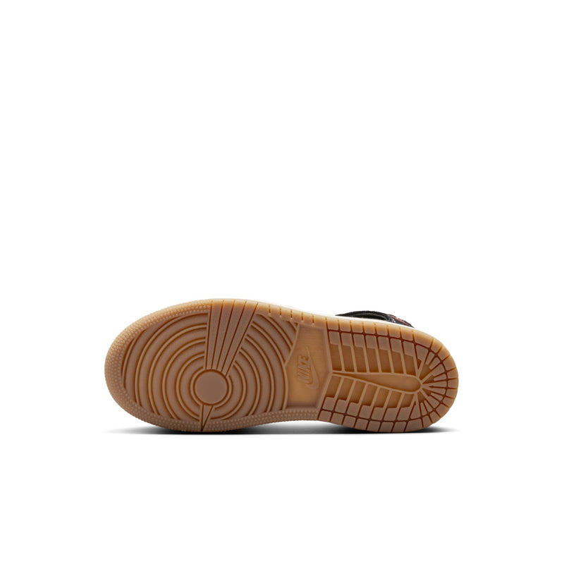 Kids high-top sneaker outsole with tan rubber tread and circular traction pattern