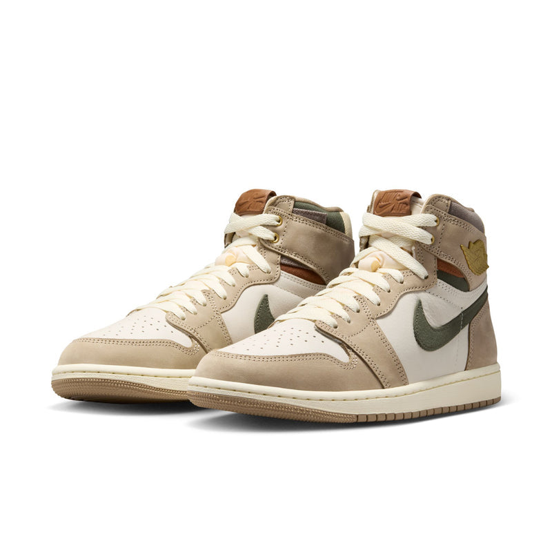 Pair of high-top sneakers with sail leather uppers, tan overlays, dark olive Nike swoosh