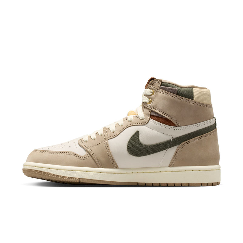 Side view of high-top sneakers with sail laces, tan suede panels, and olive Nike swoosh