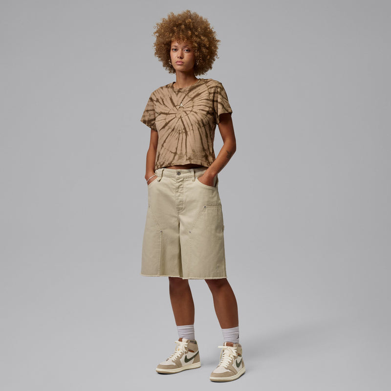Womens high-top sneakers worn with tan shorts and crew socks