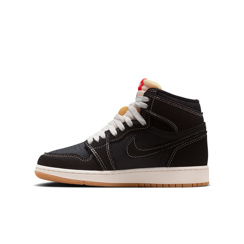Black youth high-top sneakers with white laces, Nike swoosh, and gum sole.