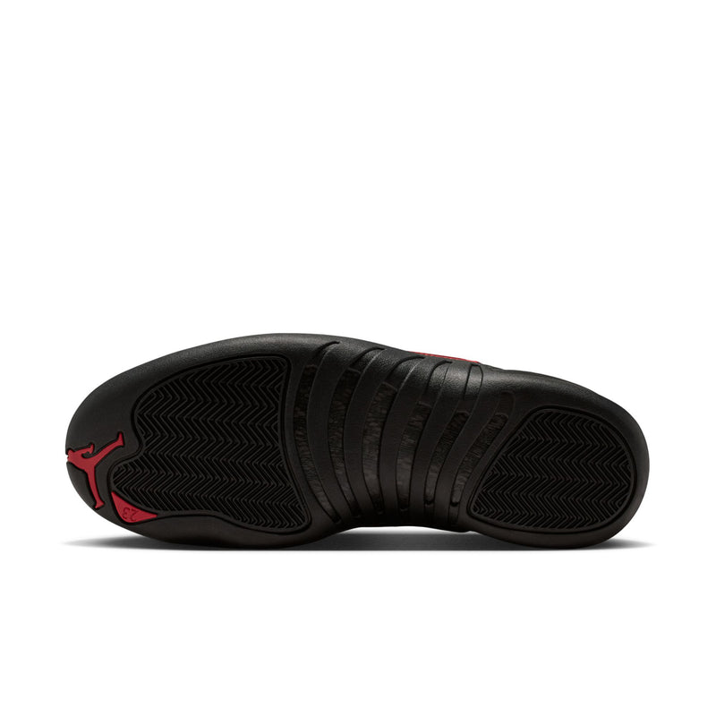 Men's black high-top sneaker outsole with textured tread and red edge