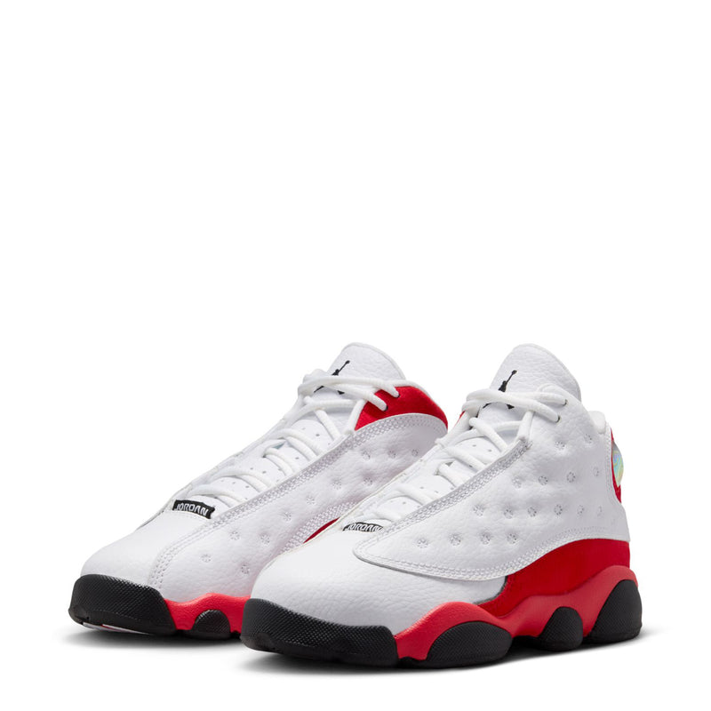 Kids' retro 13 sneakers set, white with red accents and textured black soles.