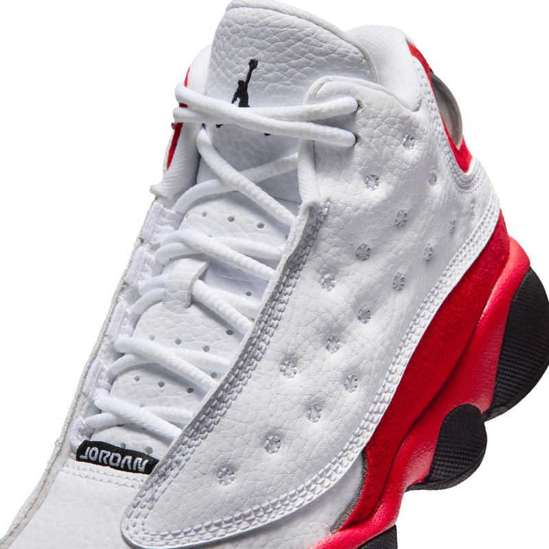 Kids' retro 13 sneaker, white lace-up upper with red side panel and JORDAN label.