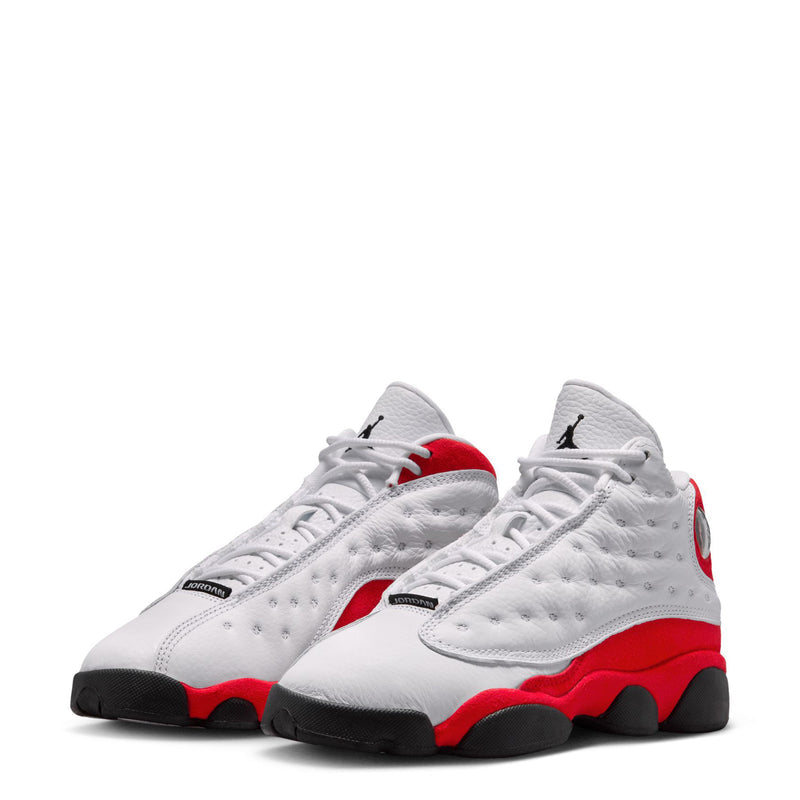 Pair of youth high-top sneakers, white with red trim, lace-up and black outsole