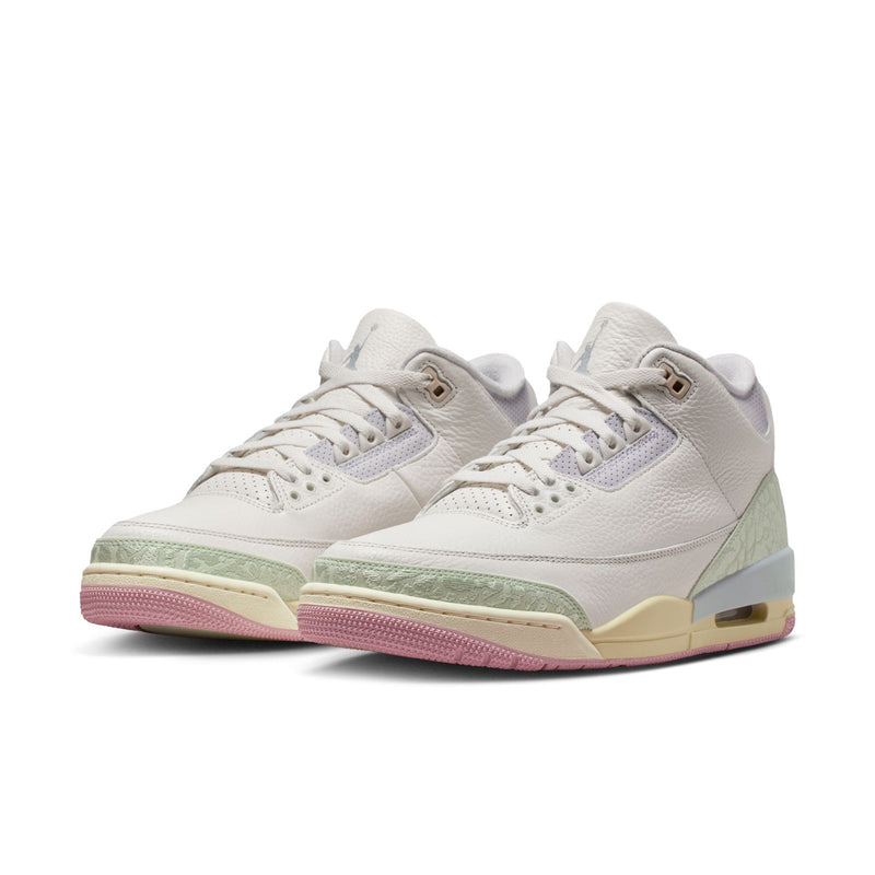 Men's retro basketball shoes pair, white uppers with mint stripes and pink outsole
