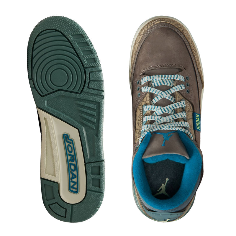 Youth Jordan sneaker bottom and toe, teal outsole with Jordan logo and Air unit