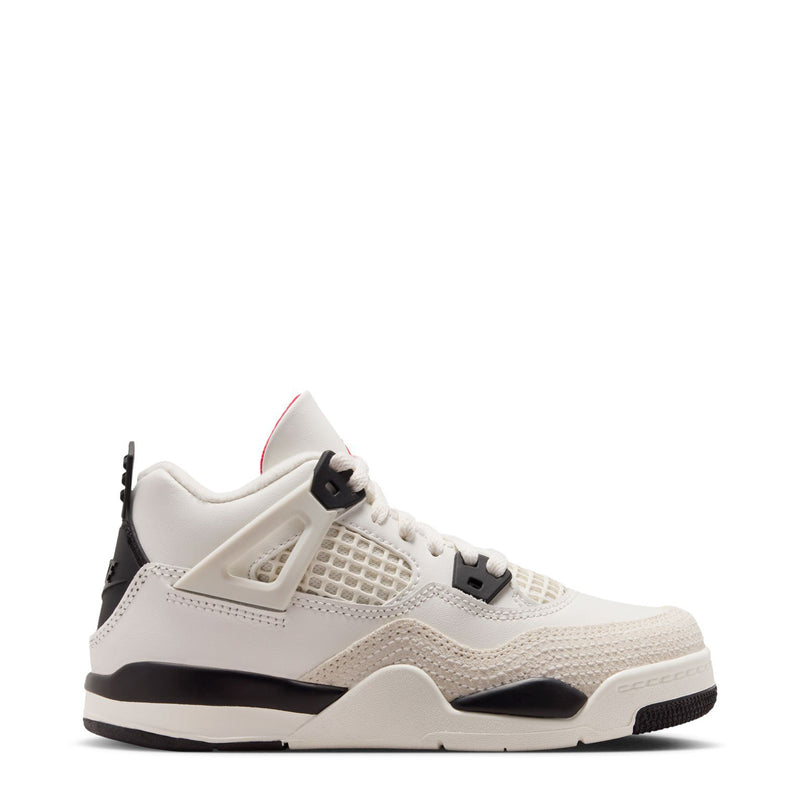 Kids white and black low-top sneakers with mesh panels and red accents
