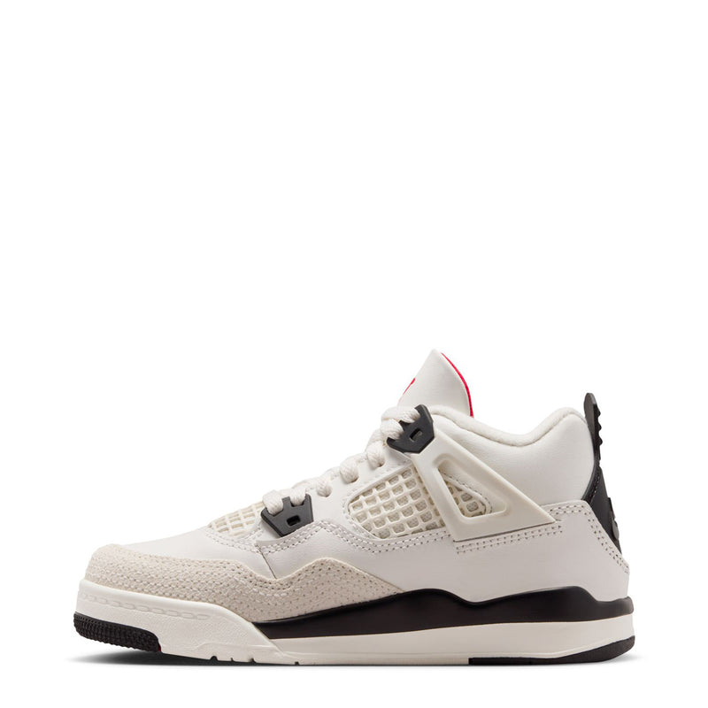 Kids white low-top sneakers with black heel tabs and red-lined collar