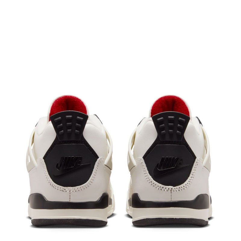 Kids white sneakers with black heel pods and red interior lining