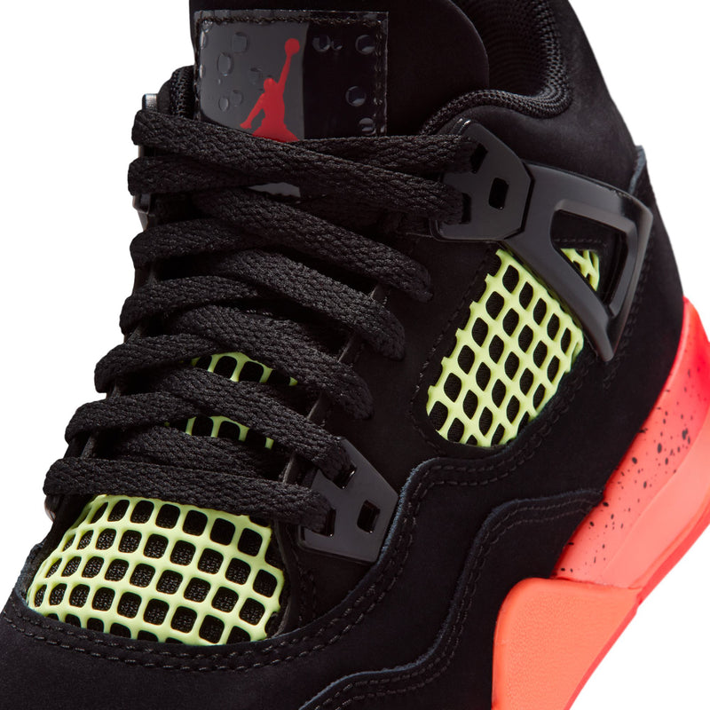Close-up of kids retro 4 upper: black mesh net panel with neon green squares