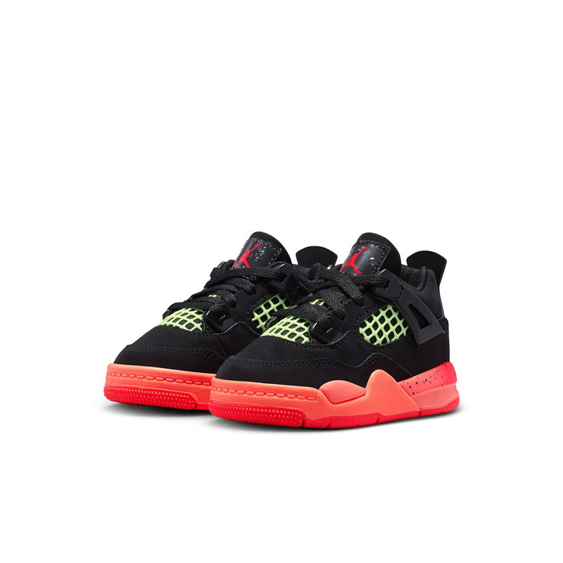 Toddler black sneakers with neon green grid panels and bright red sole, front view