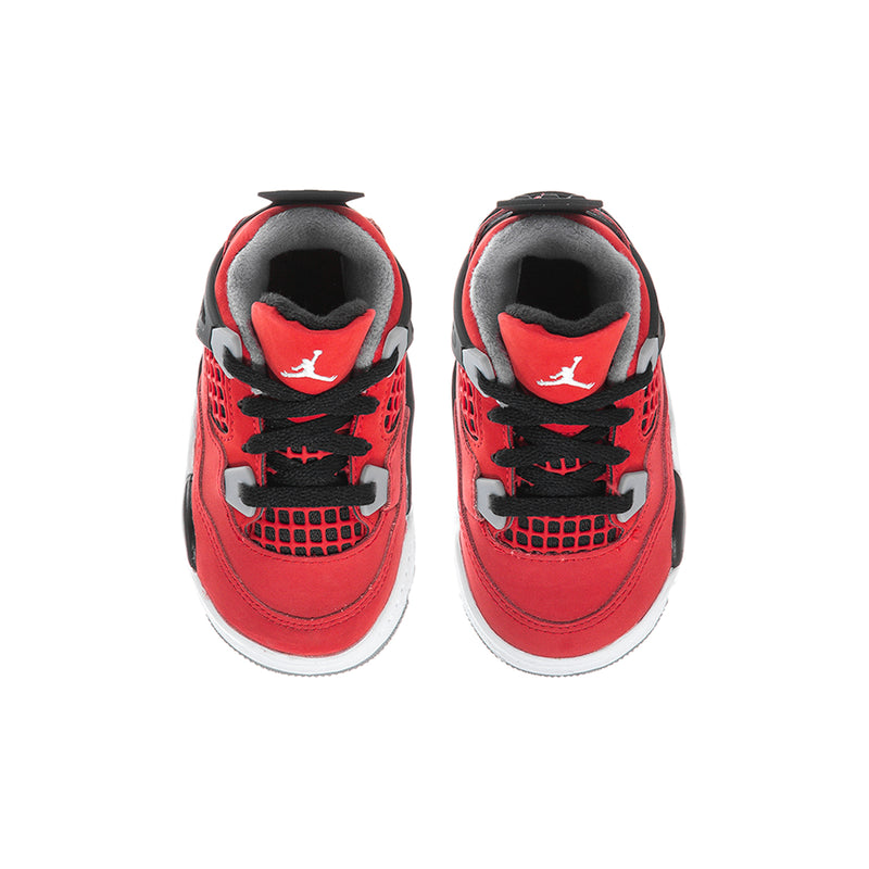 Toddler red low-top sneakers with black laces, grey lining, and tongue logo