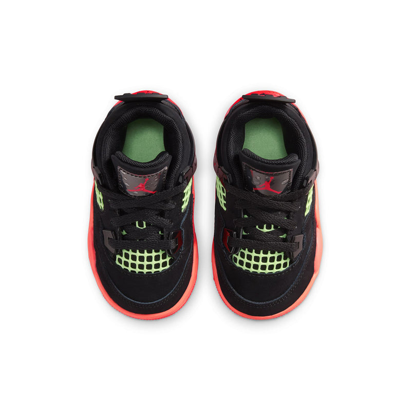 Toddler black sneakers with neon green lace panels and red trim, top view