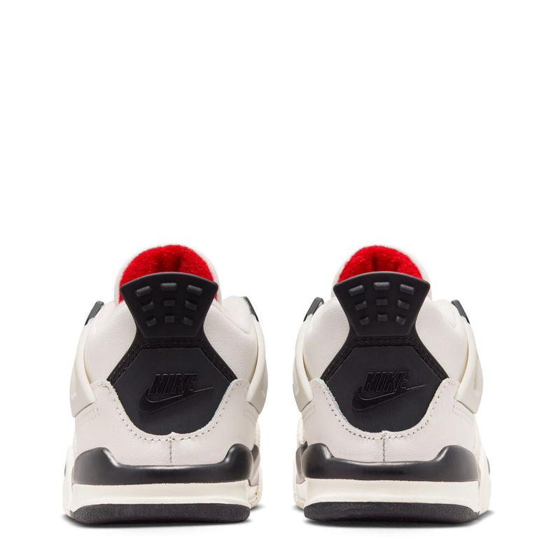 Kids sneakers heel view with black heel panel, sail uppers, and red lining