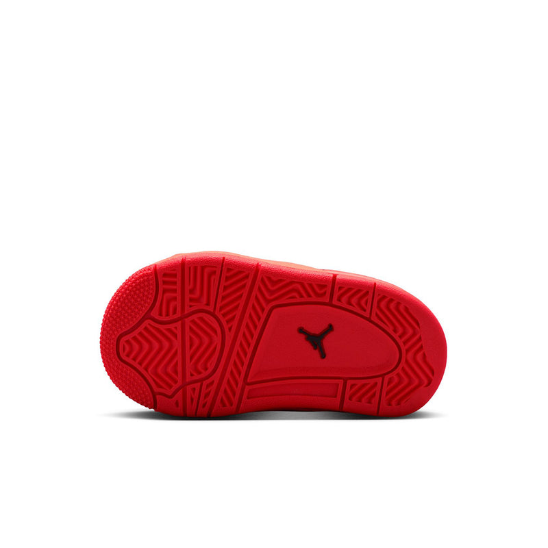 Toddler red outsole with traction pattern and black Jumpman logo, bottom view
