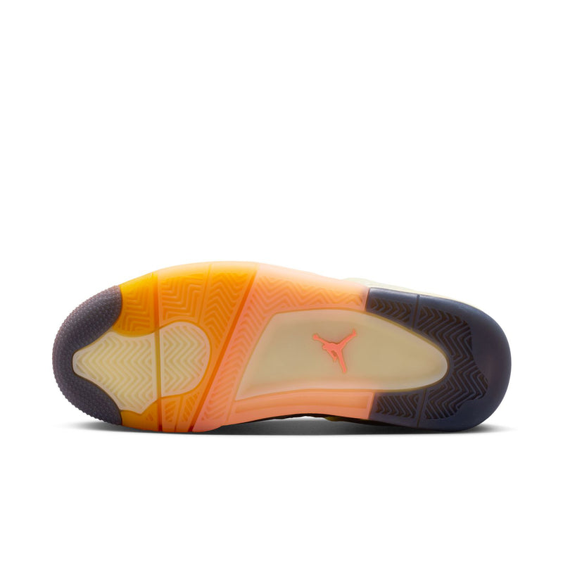 Women’s Retro 4 sneakers outsole view with orange forefoot and dark traction pattern