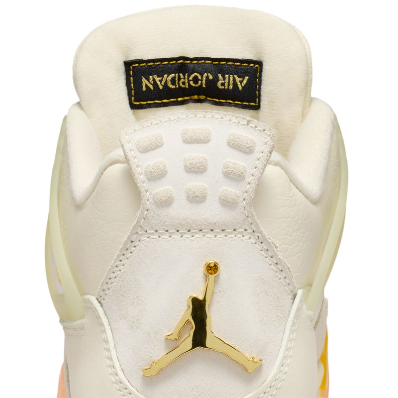 Women’s Retro 4 heel close-up with fabric label and gold Jumpman emblem