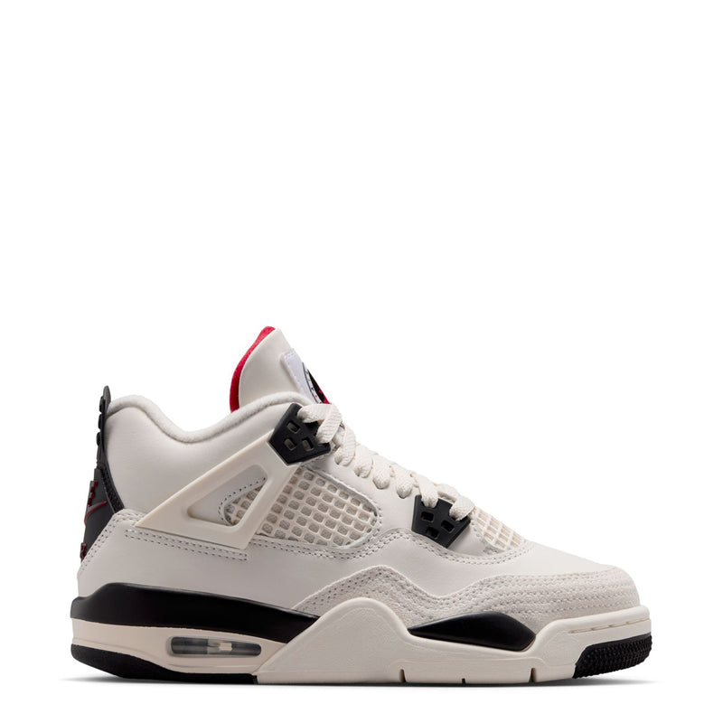 Youth sneaker in sail white with black accents and red heel detail