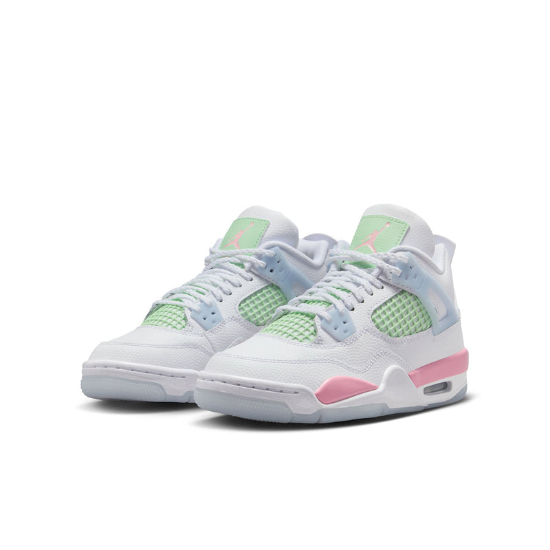 Youth lace-up sneakers in white with green mesh panels, light blue trim, and pink highlights.