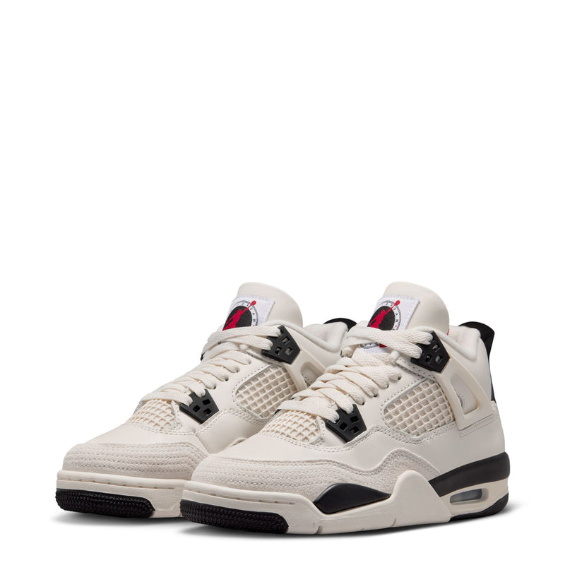 Youth sneaker pair front view in sail white with black and red details